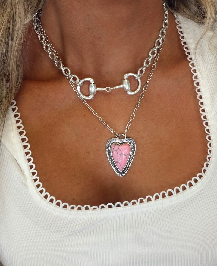 Silver horse bit chain necklace featuring a chunky paperclip chain and equestrian-inspired centerpiece, perfect for layering.